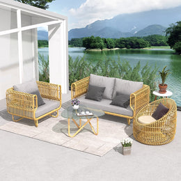 4 Pieces Rattan Outdoor Sofa Set with Glass Top Coffee Table and Cushions in Yellow Yellow